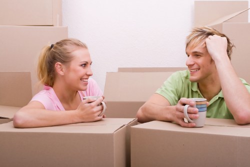 Packed office boxes and furniture ready for relocation