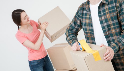 Careful transport of bulky household items in West Kensington