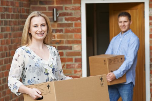 Packed boxes and removal van for a West Kensington house move