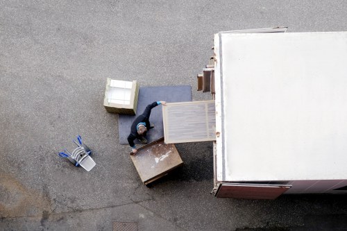 Removal team handling access and loading in West Kensington