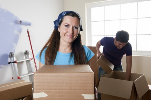 Packed moving boxes and furniture ready for a local West Kensington home move