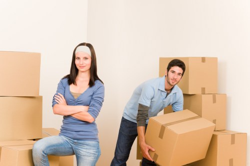 Boxes and furniture being loaded for a local move in West Kensington