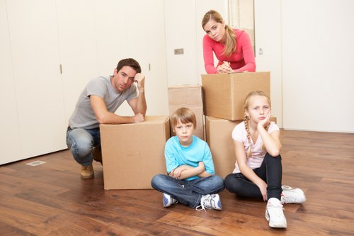 Careful handling of boxes and furniture during a West Kensington move