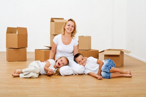 Packed boxes and protective wrapping prepared for a local move