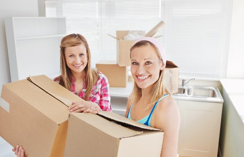 Mover navigating stairs in a West Kensington property