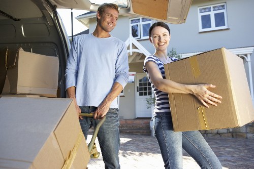 West Kensington removals service unloading boxes and furniture at a local property